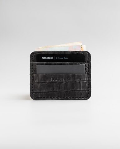 price for Card holder made of calf leather embossed with crocodile in black color