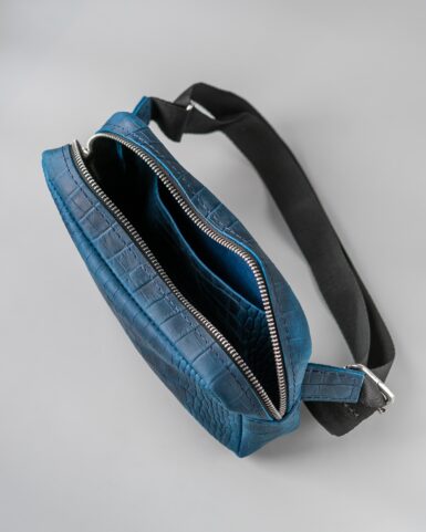 Leather belt bag (bananka) in dark blue, crocodile embossed