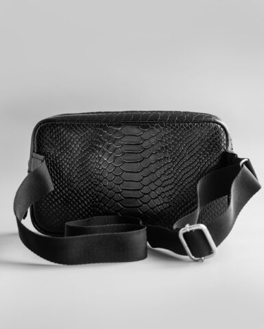 Leather belt bag (banana) in black, embossed with a python in Kyiv