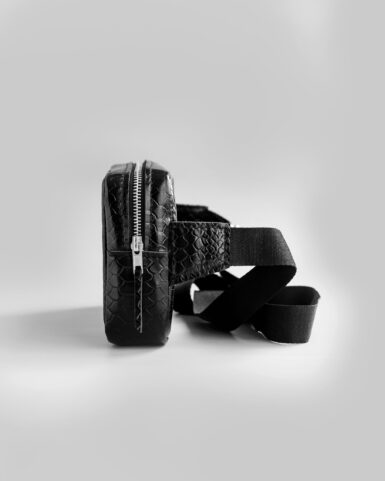 price for Leather belt bag (banana) in black, embossed with python