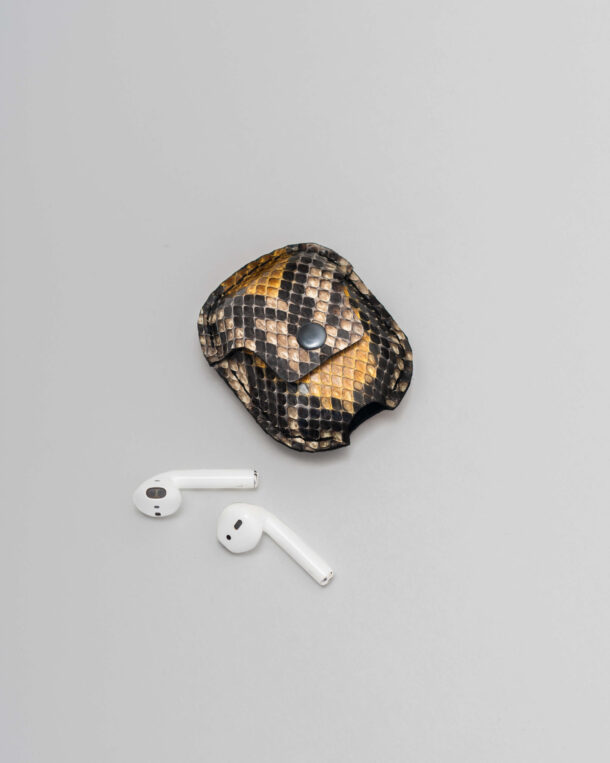 Case for AirPods made of grey-yellow python skins