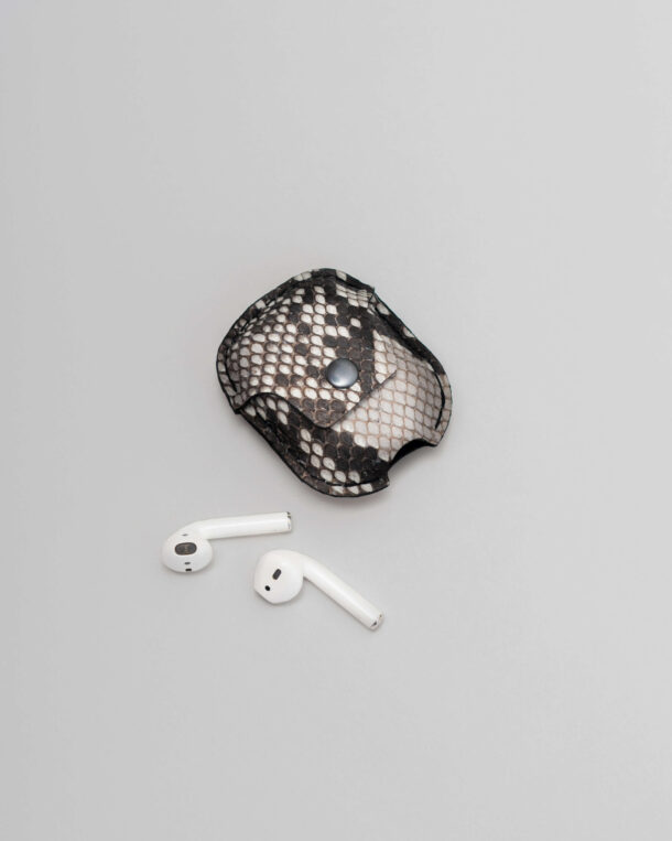 Case for AirPods made of black and white python skins