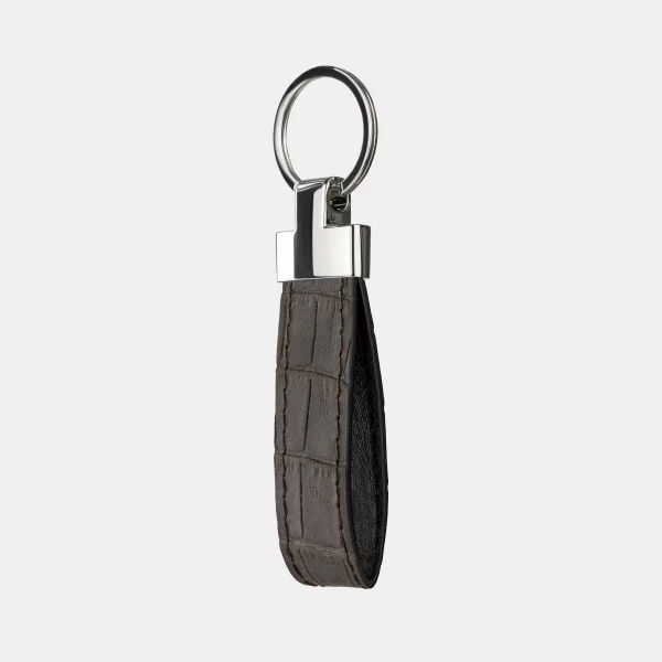 price for Keychain made of dark brown crocodile embossing