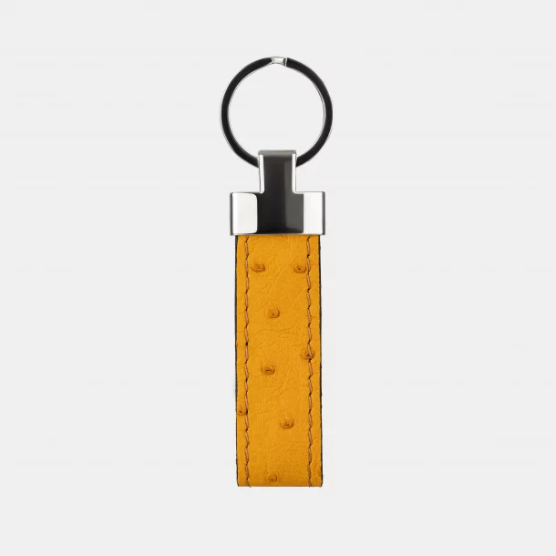 Keychain made of orange ostrich skin with follicles