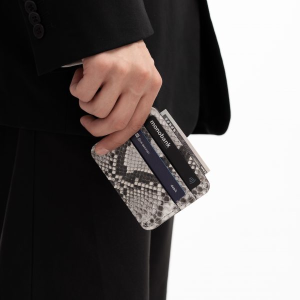 Cardholder made of black and white python skin with small scales in Kyiv