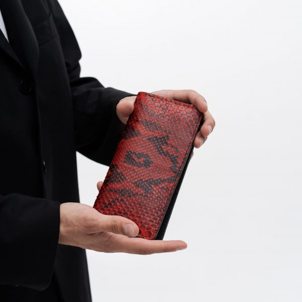 Wallet made of red python skin with small scales