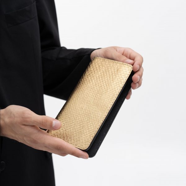 Wallet made of golden python skin with small scales