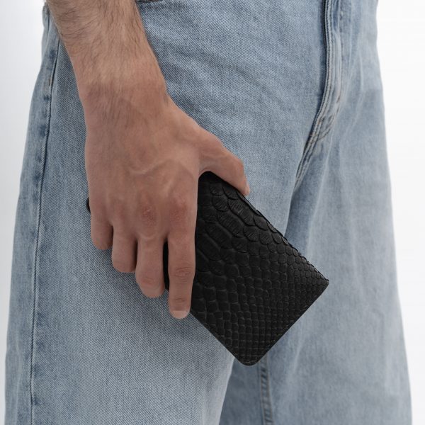 Wallet made of black python skin with wide scales