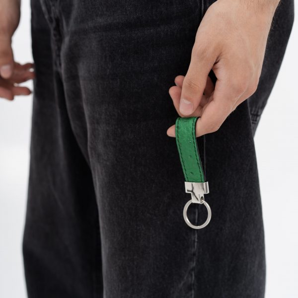 Keychain made of green ostrich skin with follicles