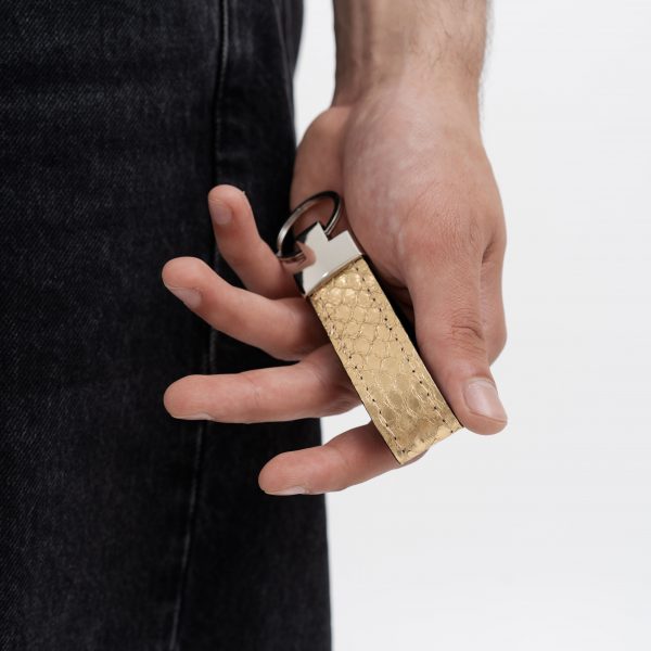 Keychain made of golden python skin in Kyiv
